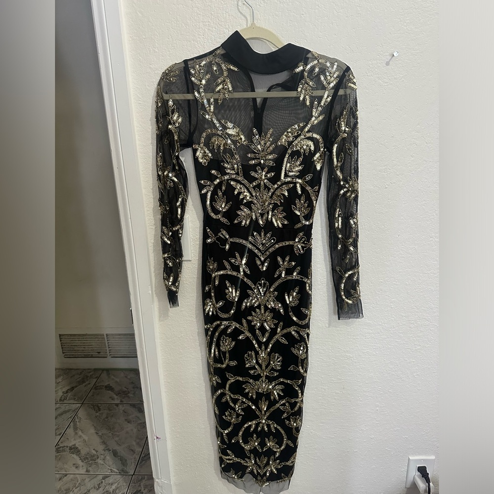 Elegant Black and Gold Embellished Dress